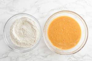 Bowl of flour and bowl of sweet potato batter
