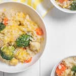 bowl with rice cheesy carrots and broccoli