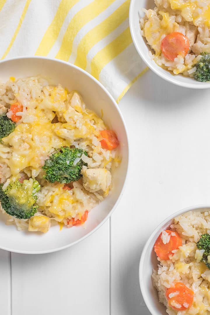 bowl with rice cheesy carrots and broccoli 