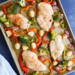 Sheet pan with broccoli bell peppers, onion and red potatoes