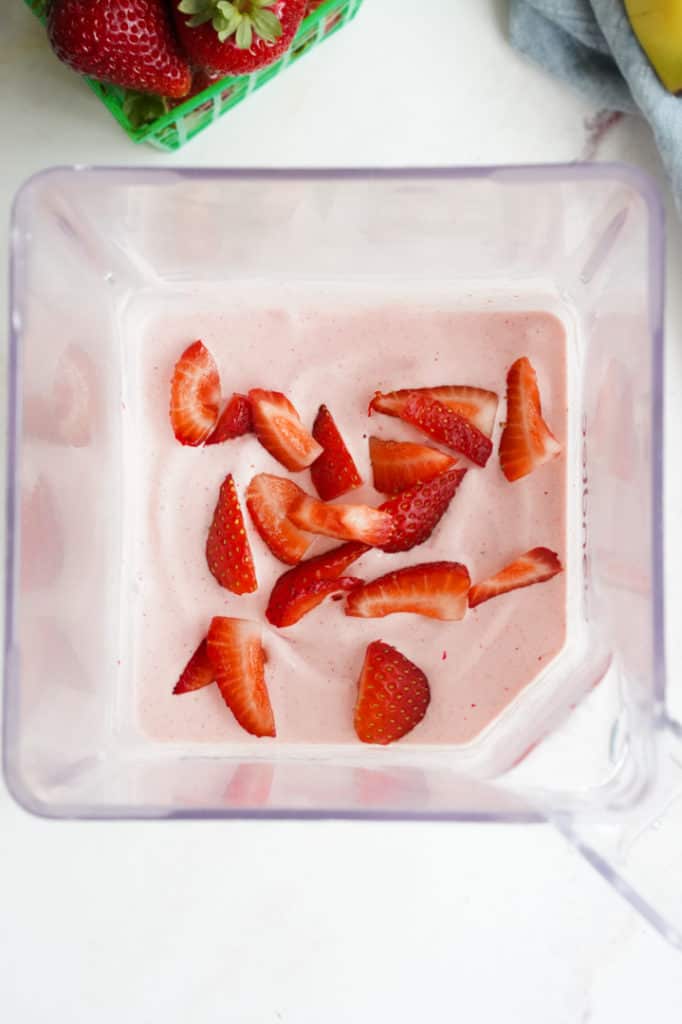 Close up of strawberries in a blender 