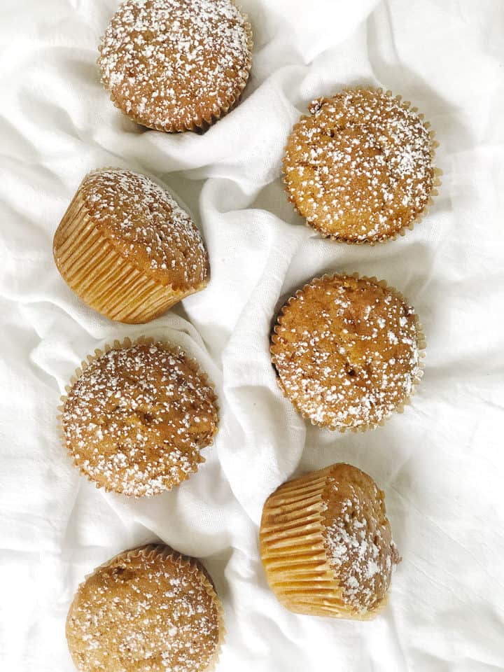 Muffins flat lay on a white linen 