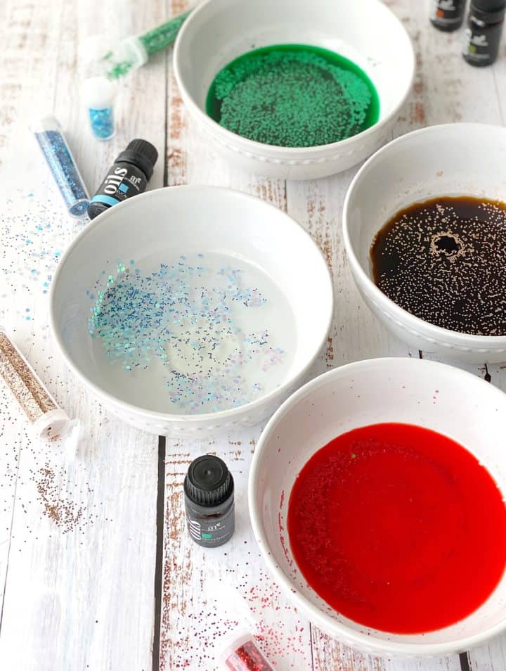 bowls of water and dye and essential oils 