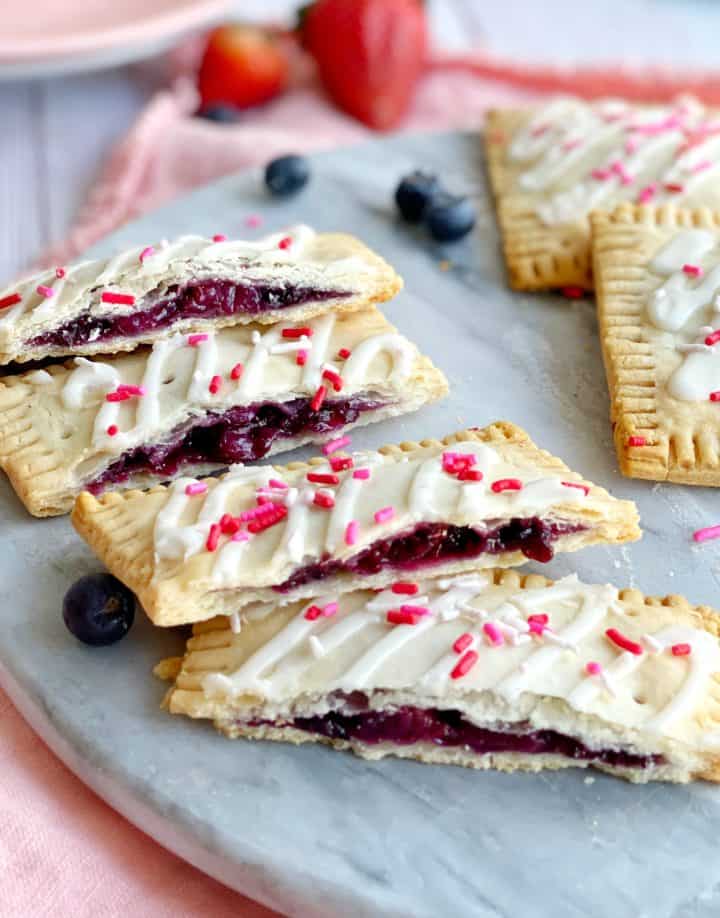 Cut open pastries with berries 