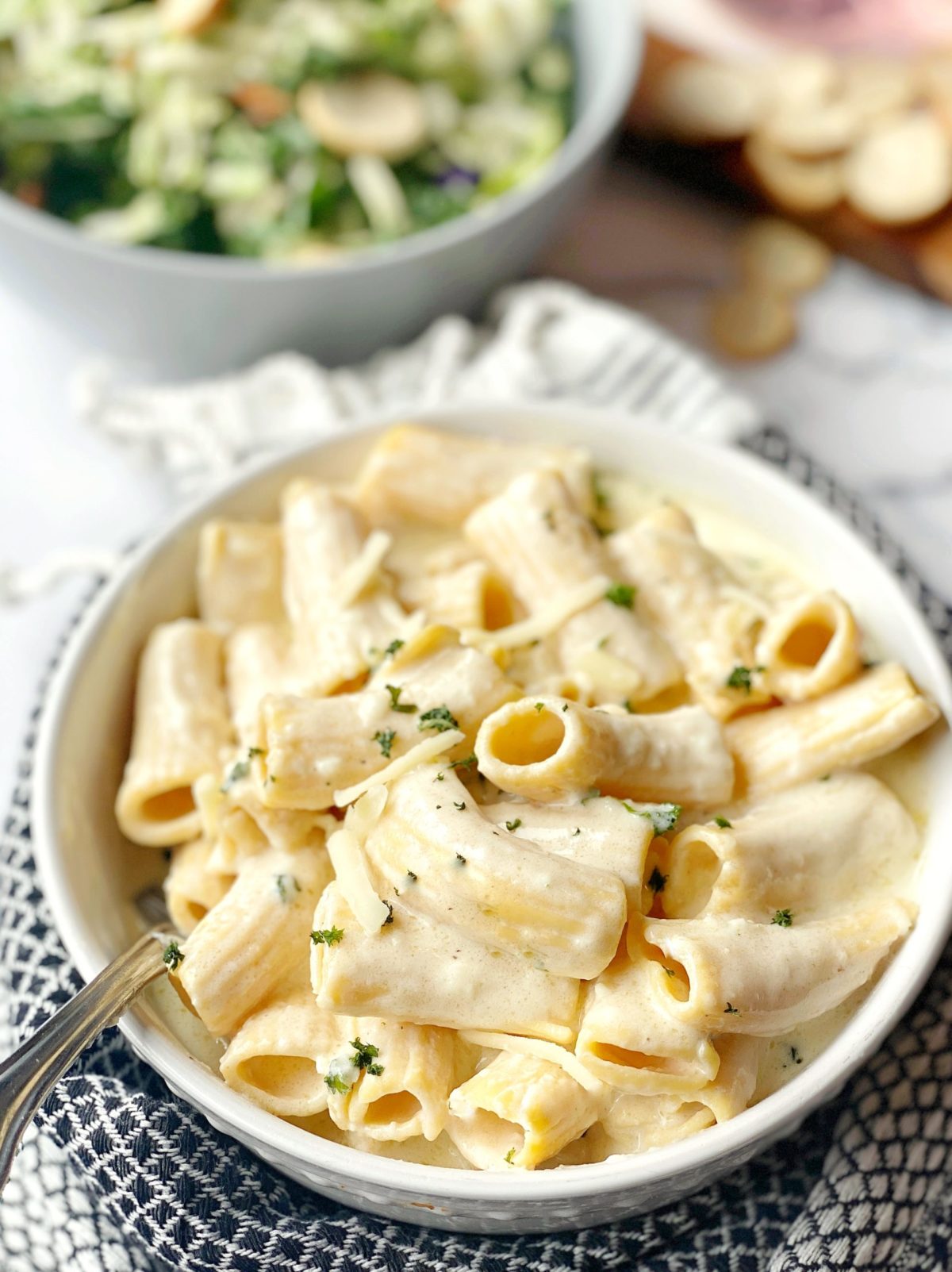 bowl of pasta with white sauce