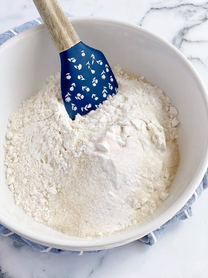 Spatula in a bowl of flour mixture 