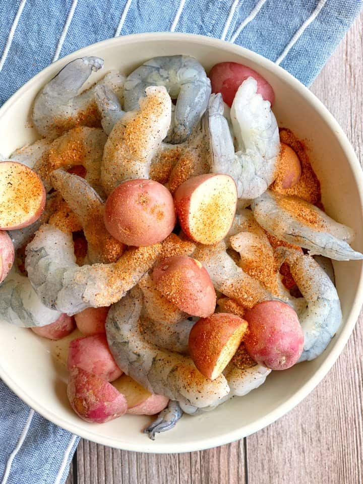 Bowl of seasoned shrimp and potatoes