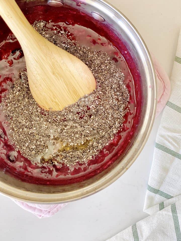 sauce pan with chia seeds and a spatula