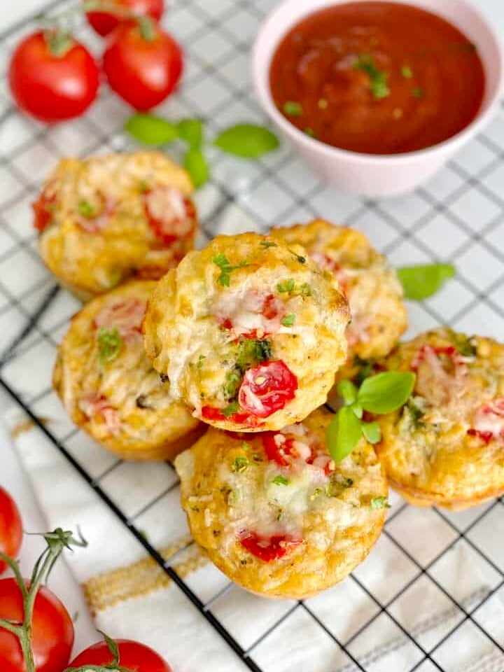 close up of stacked pizza muffins