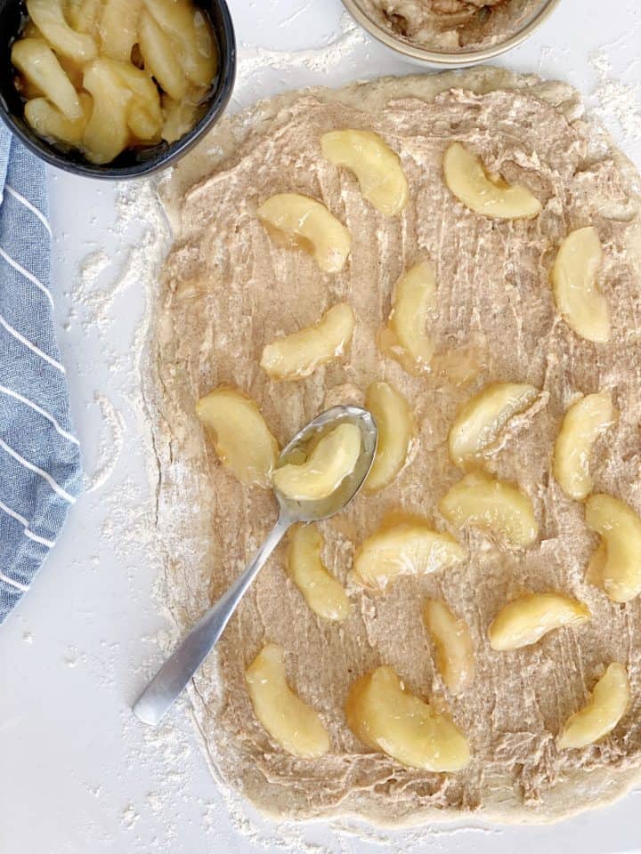 rolled out dough with apple pie filling 