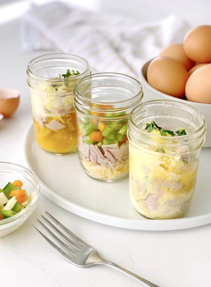 mason jars with eggs, and toppings 