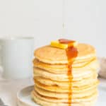 pancakes stacked with syrup on top