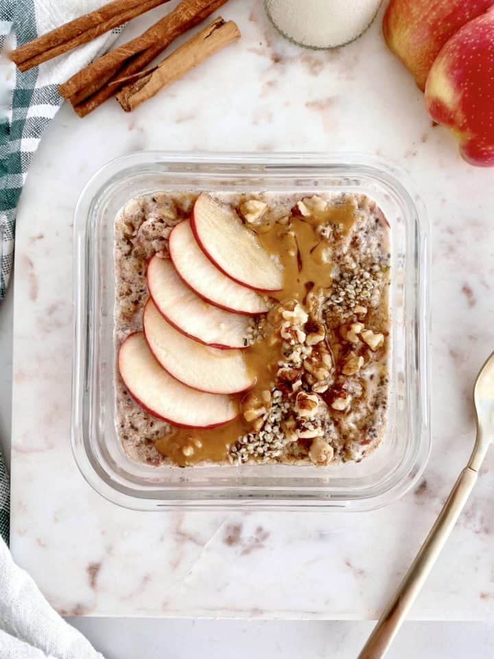 bowl of oats with apples on top 