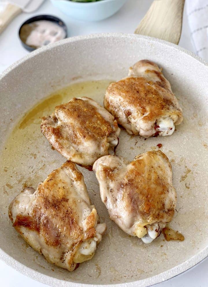 brown chicken in a pan with a little oil 