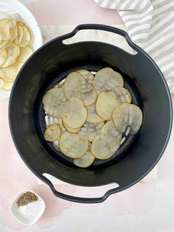 potato slices in an air fryer