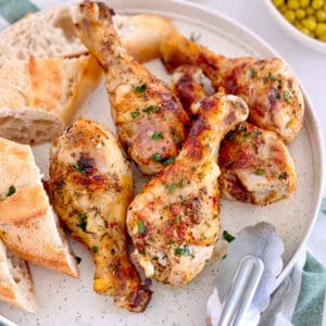 plate of grilled chicken legs on a plate