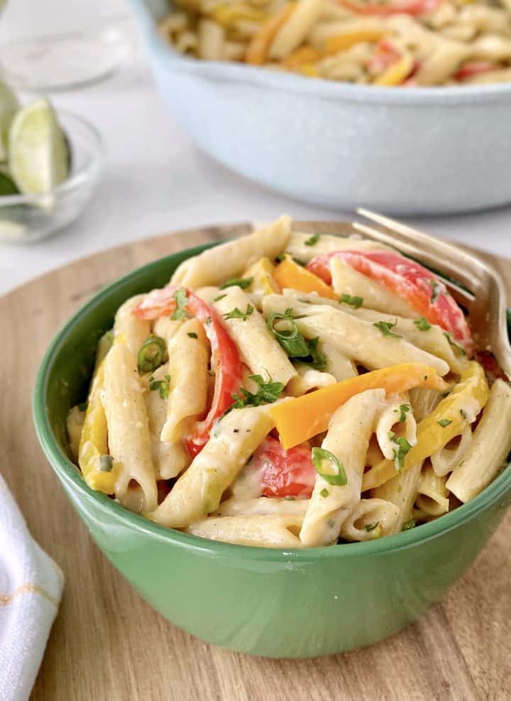 close up of bowl of pasta with bell peppers