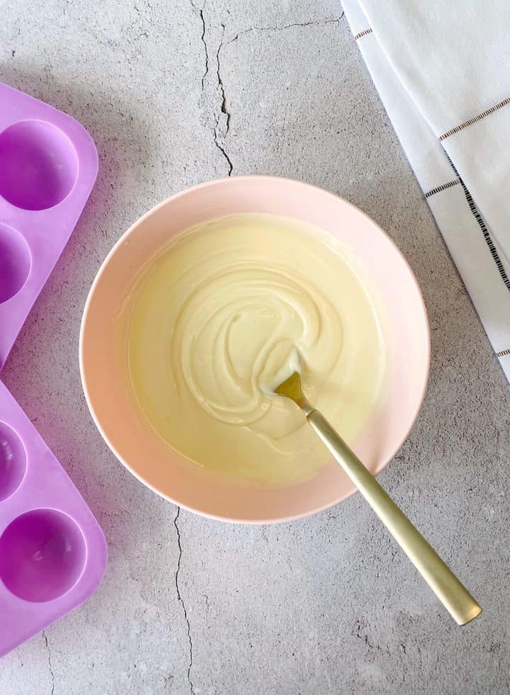 pink bowl of melted chocolate