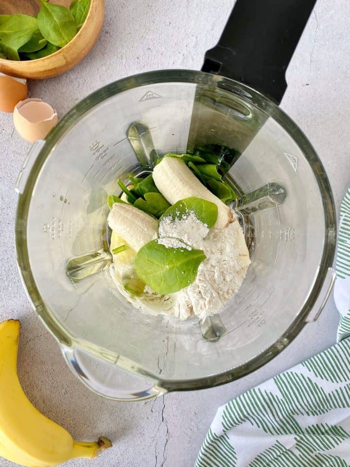 bananas, spinach and egg in a blender
