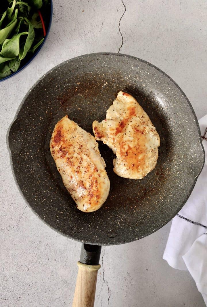 skillet with chicken breast