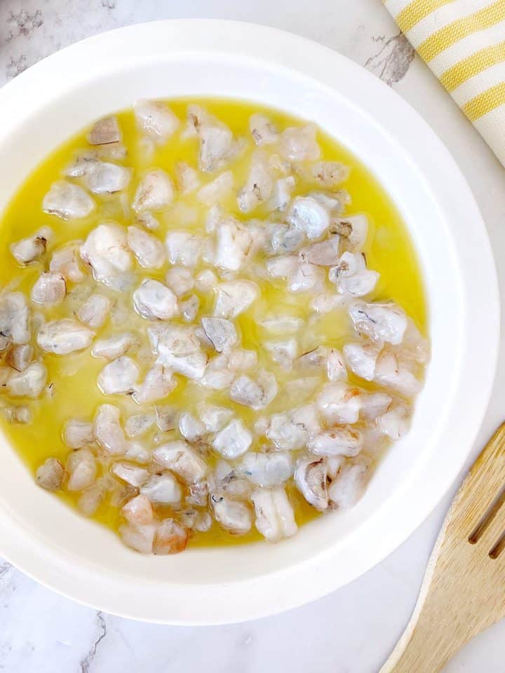 bowl of lemon juice with shrimp 