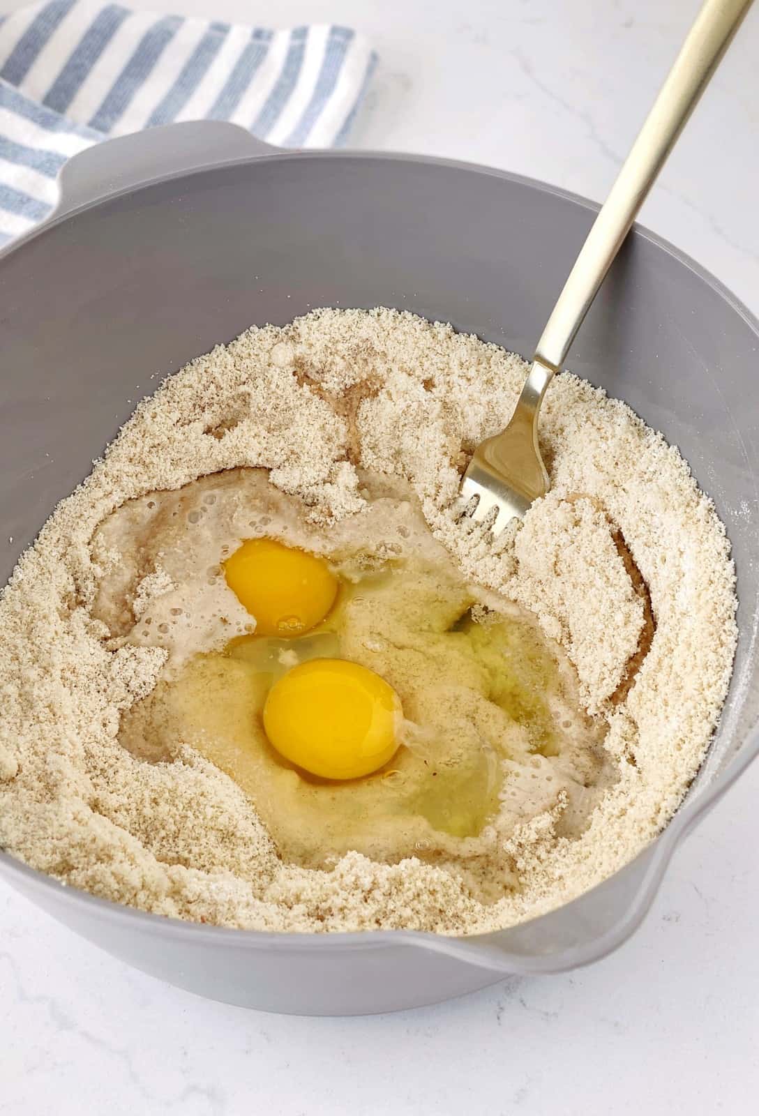 bowl of almond flour vanilla and eggs 