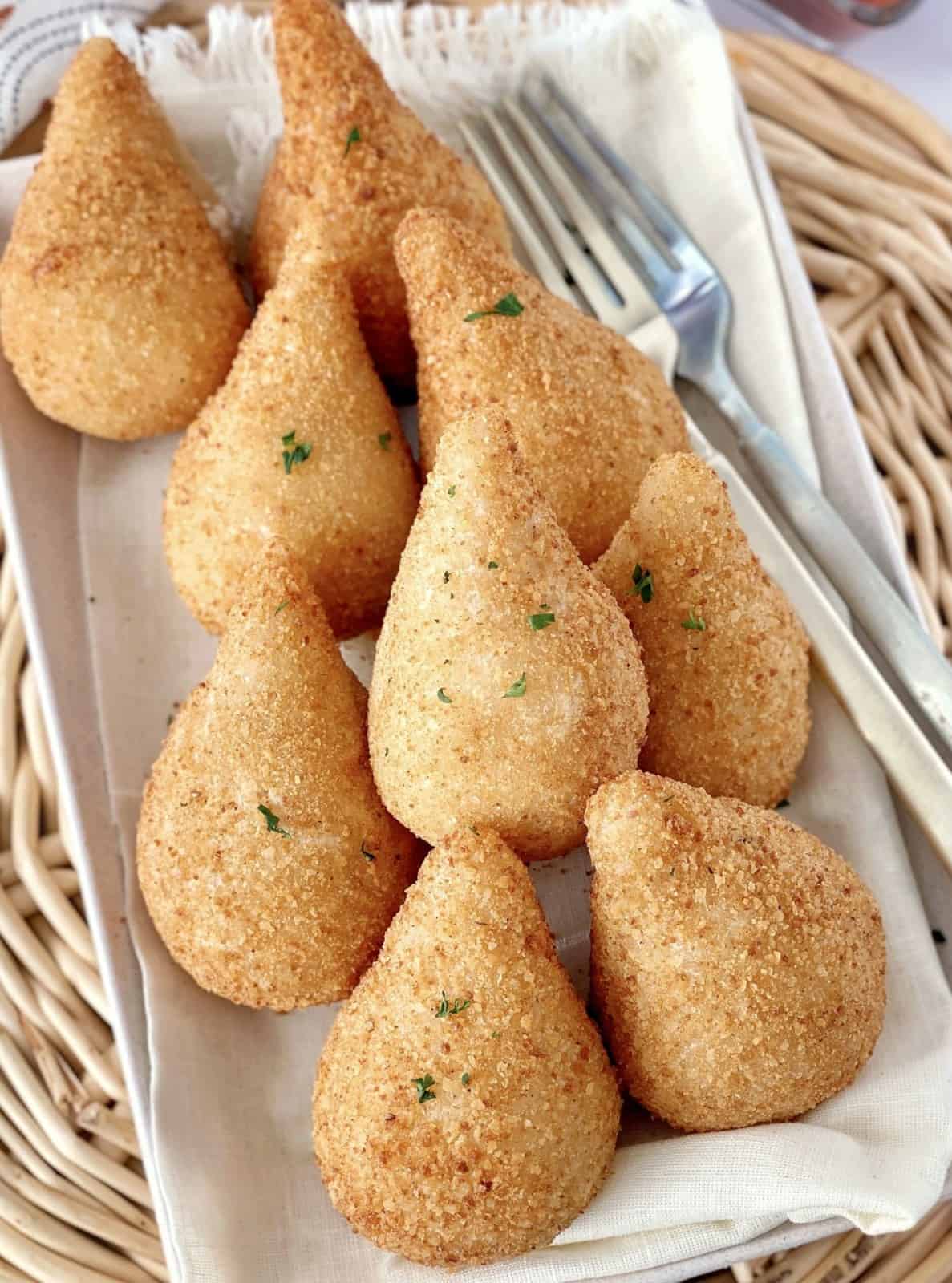 plate of coxinha's with garnish