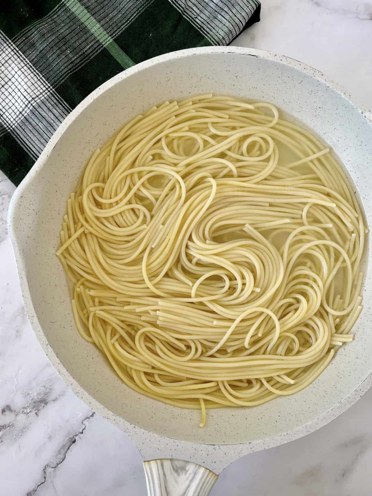 cooked noodles in a pan