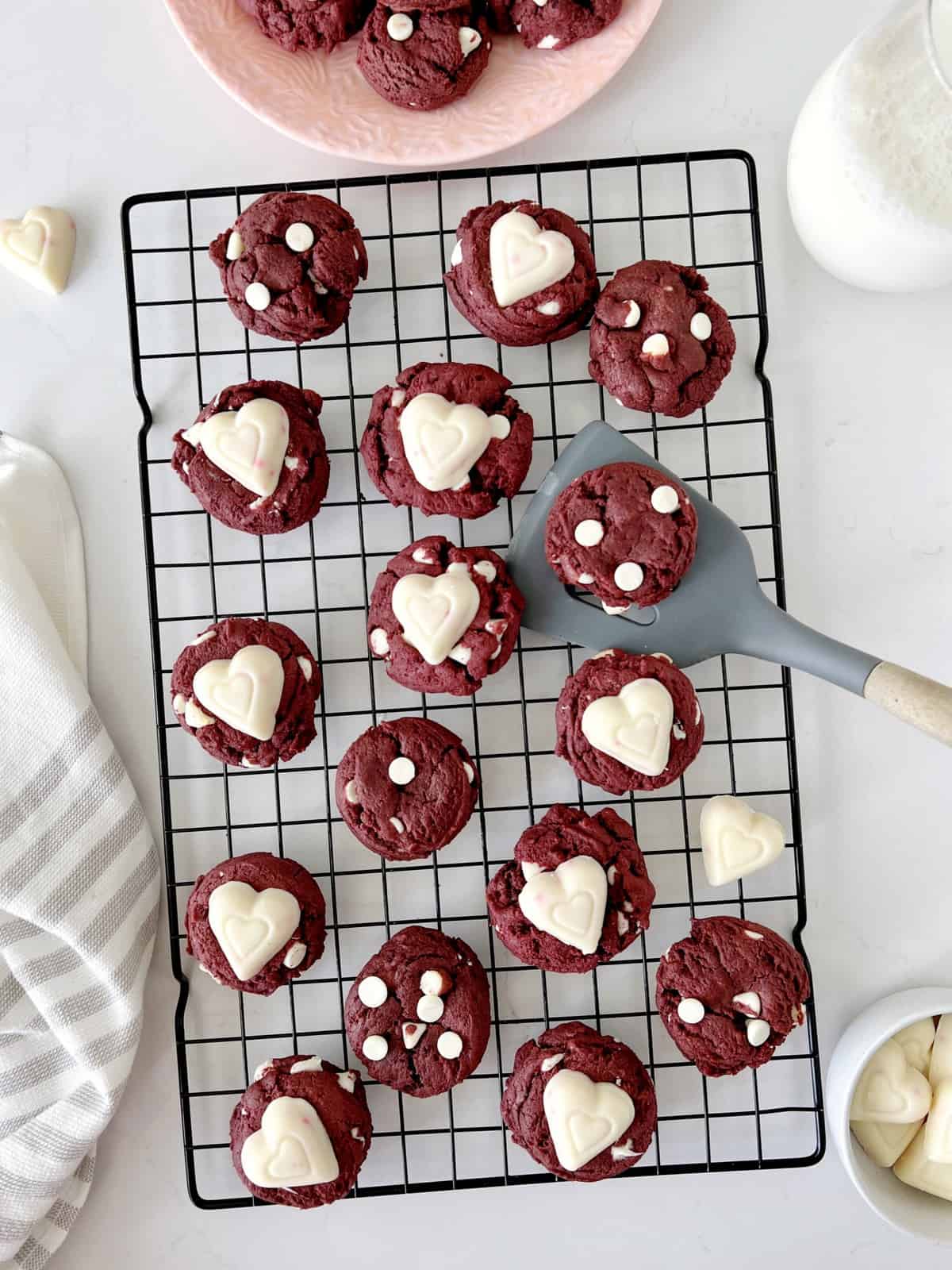 several red velvet cookies  on a wire rack 