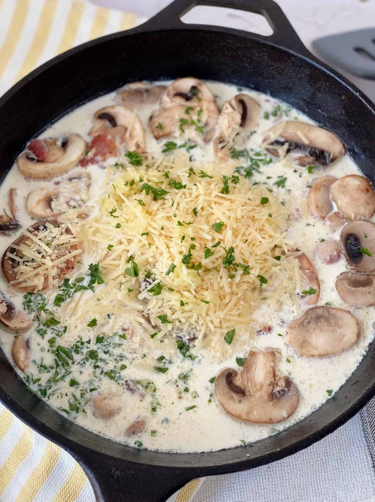 skillet with cream mushroom chicken and mushrooms and cheese 