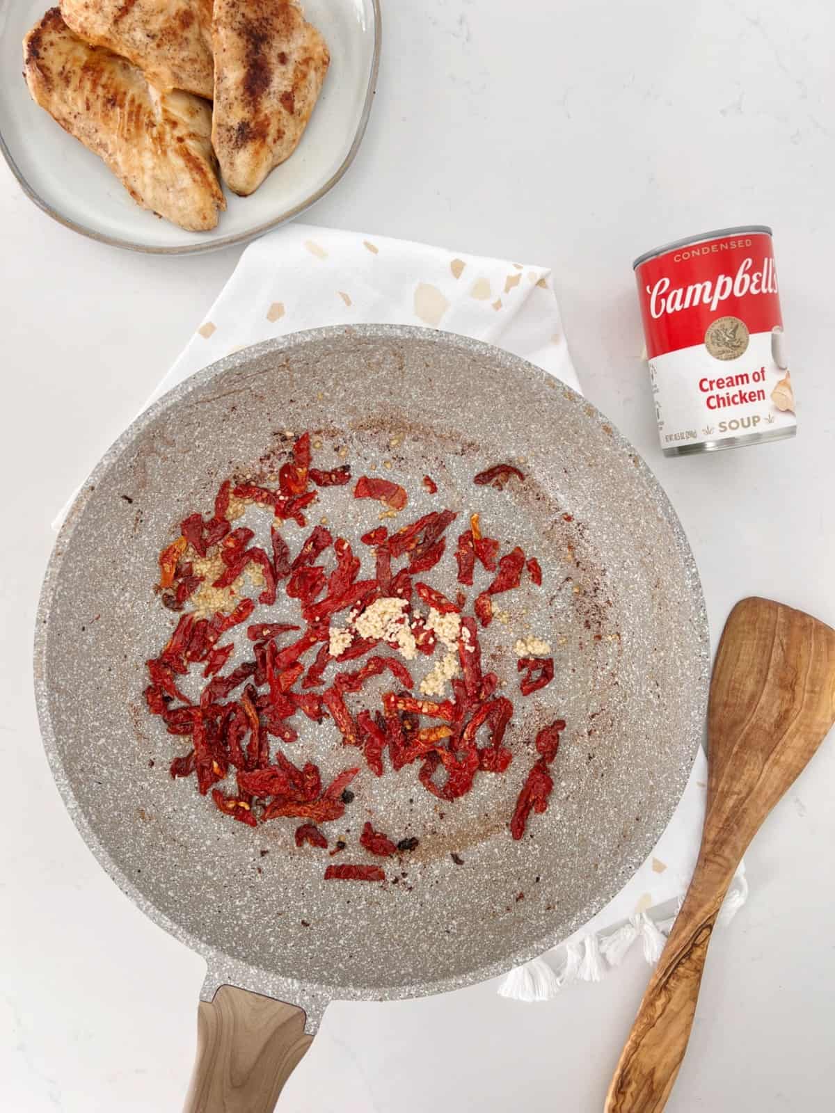 sun dried tomato on a pan next to campbells soup 