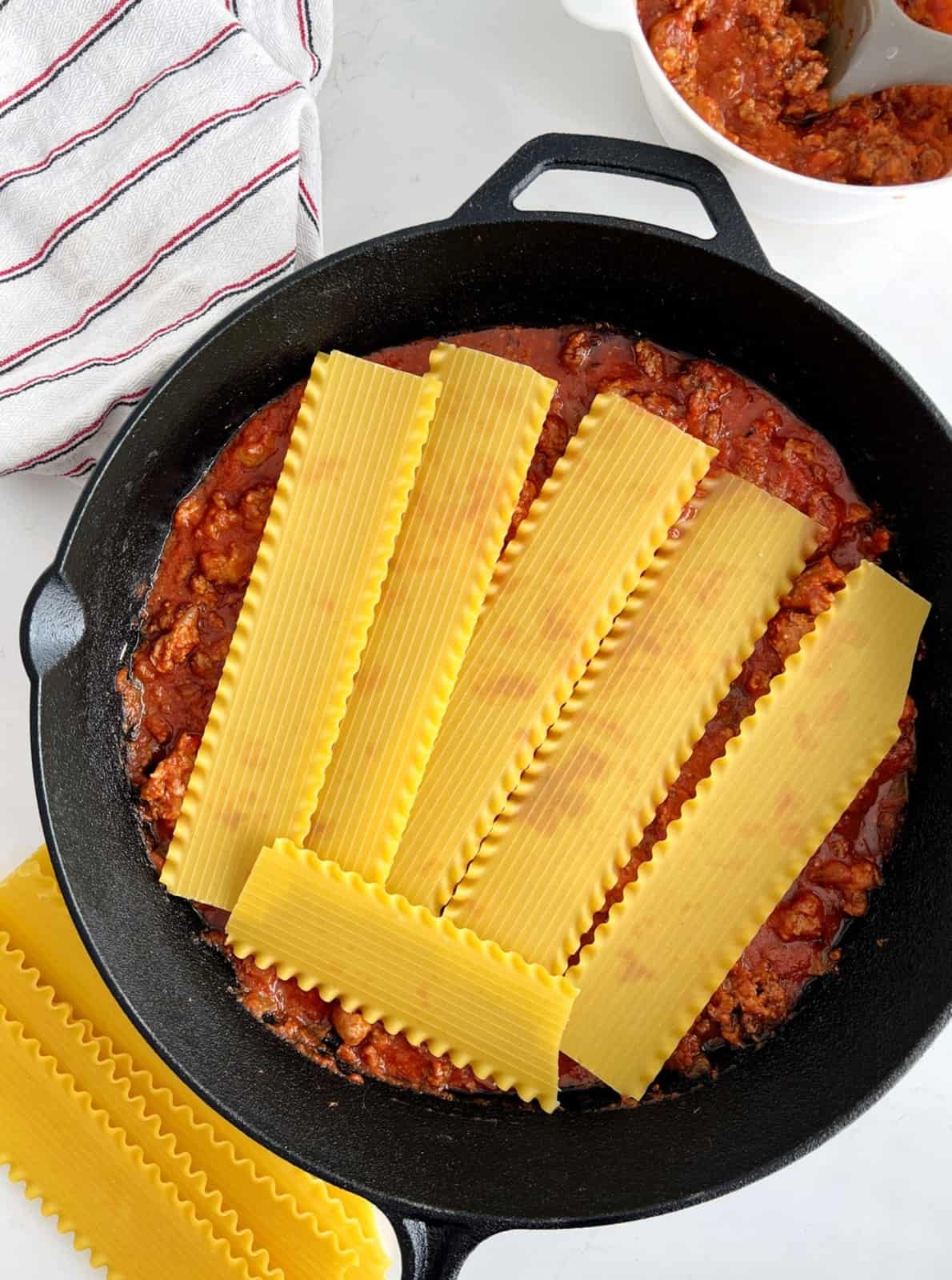 lasagna noodles on top of skillet
