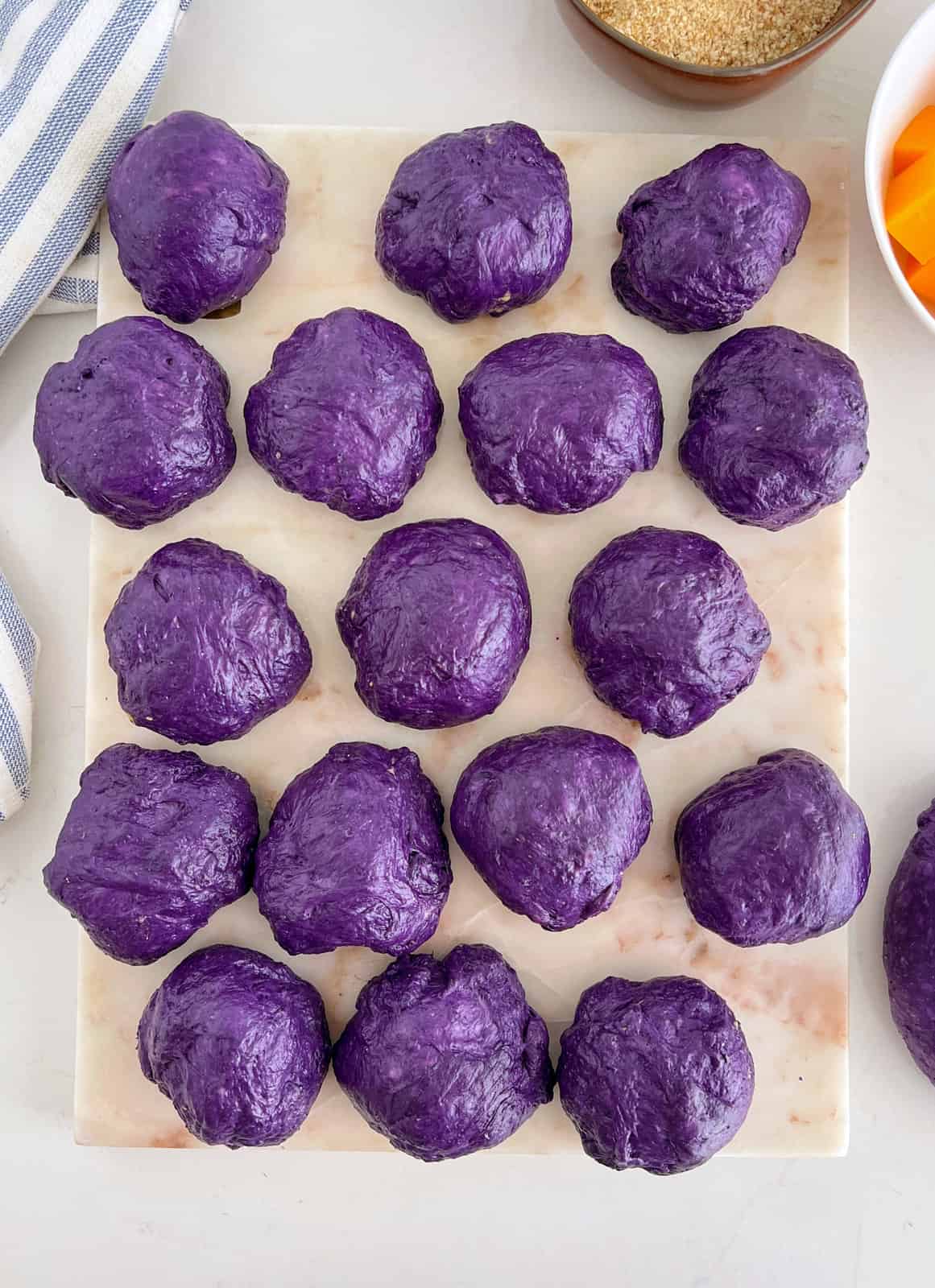 several purple dough balls 