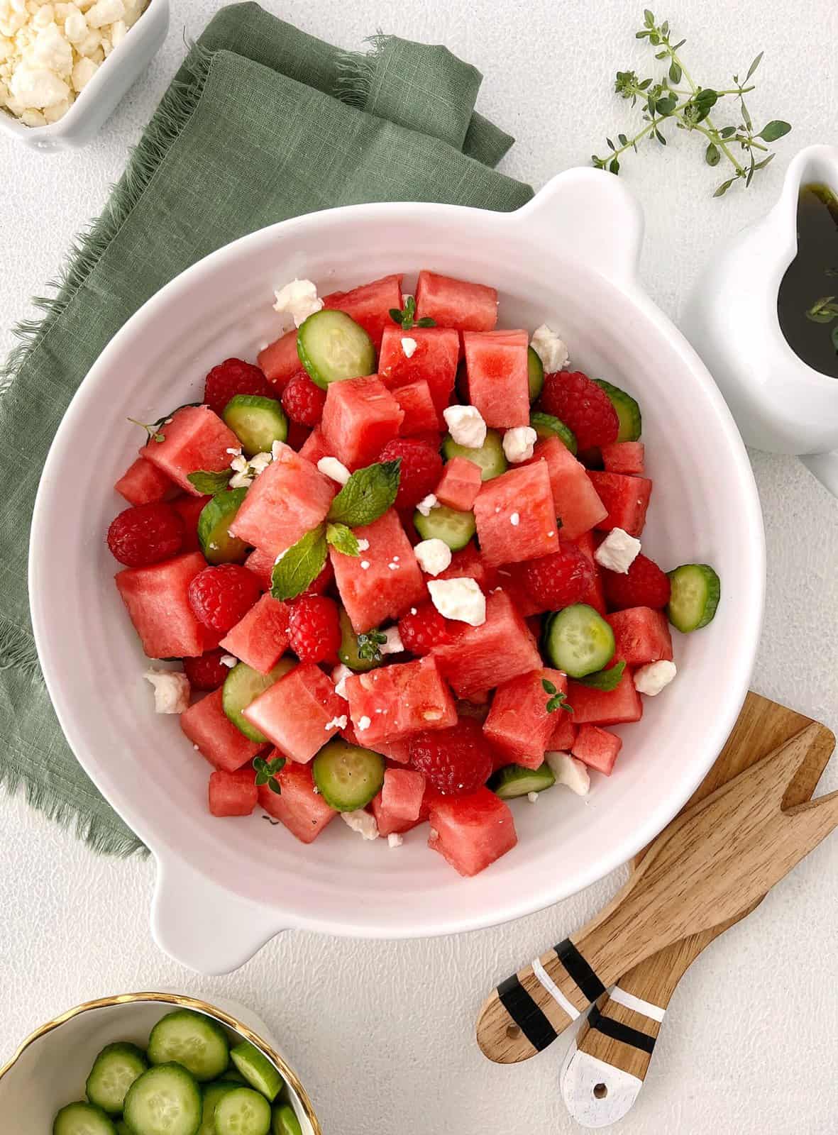 bowl of watermelon with cucumber and feta 