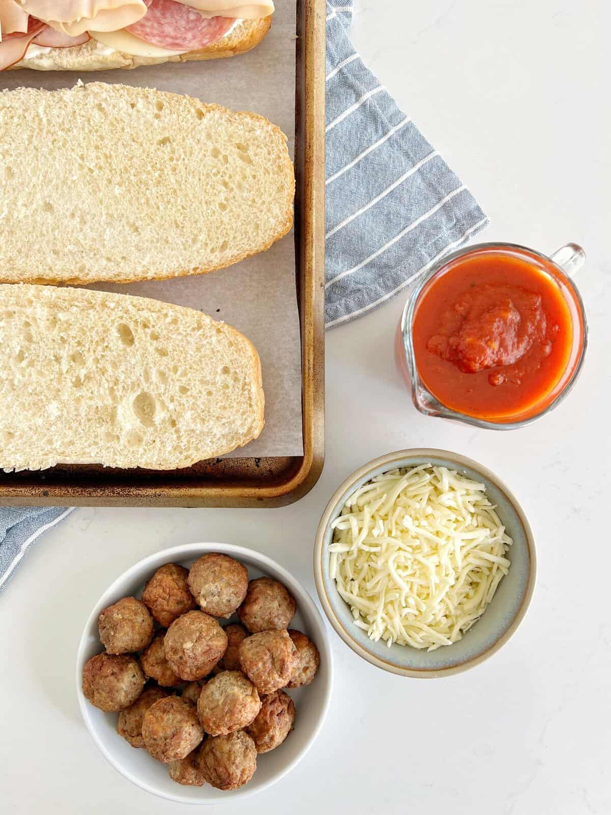 meatballs with bread, marinara and cheese 