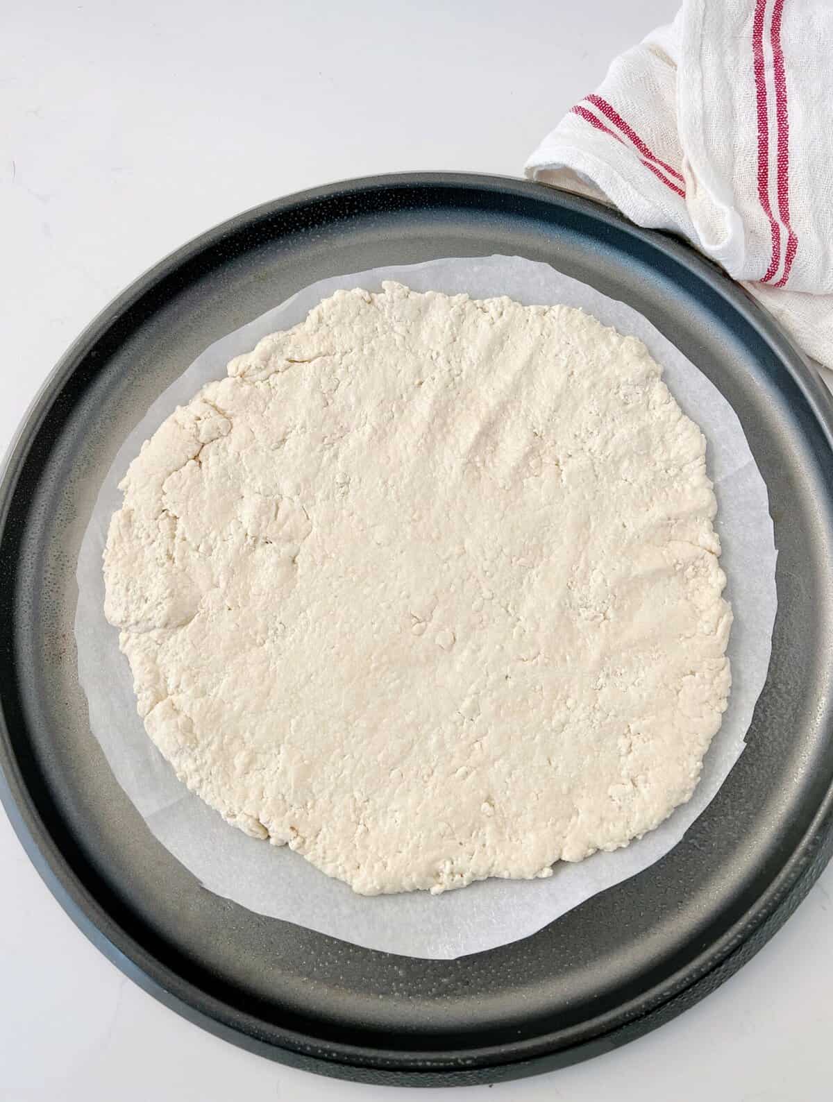 rolled out dough on baking sheet 