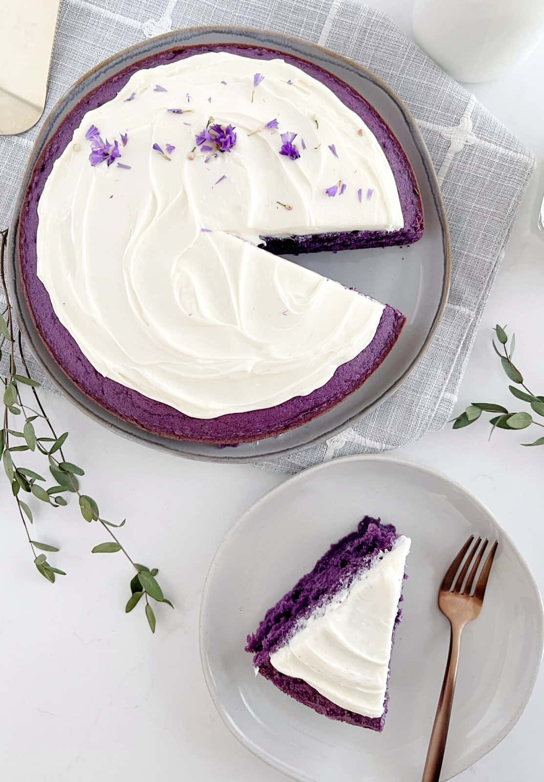 ube cake with a slice cut 