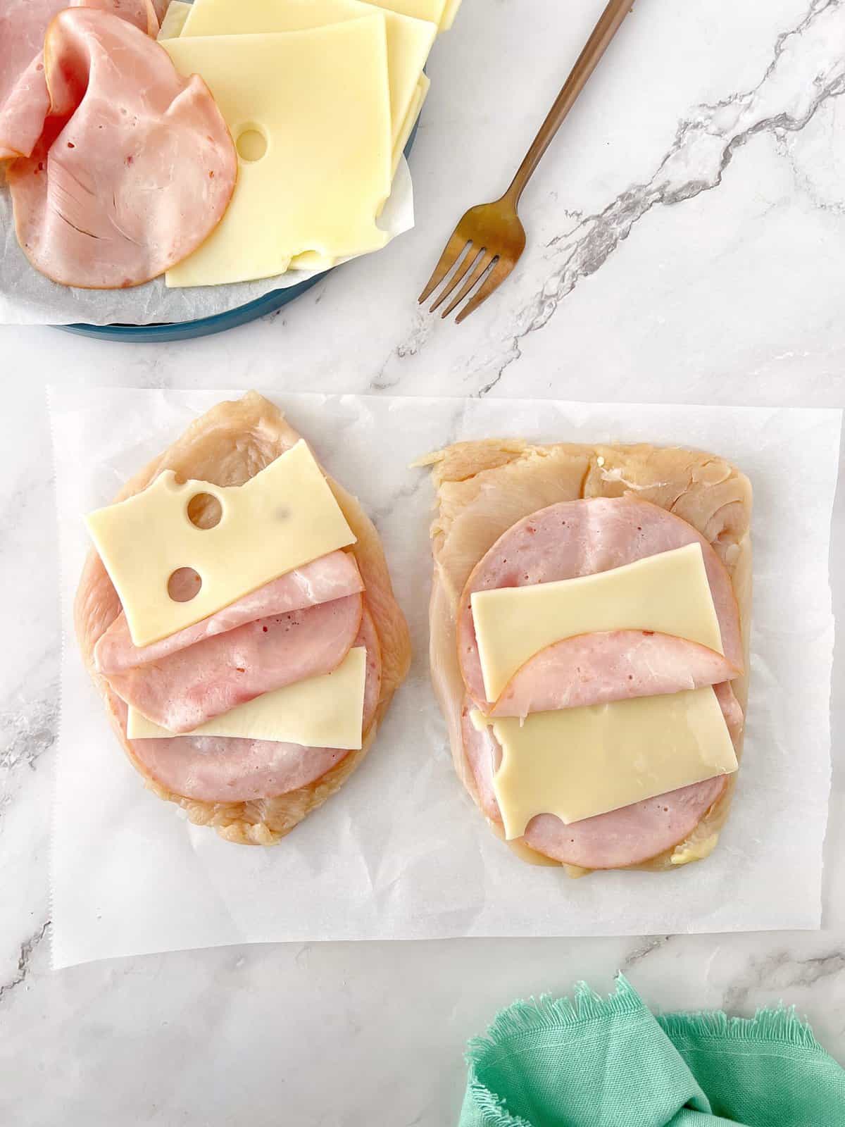 swiss cheese and ham on chicken breasts 