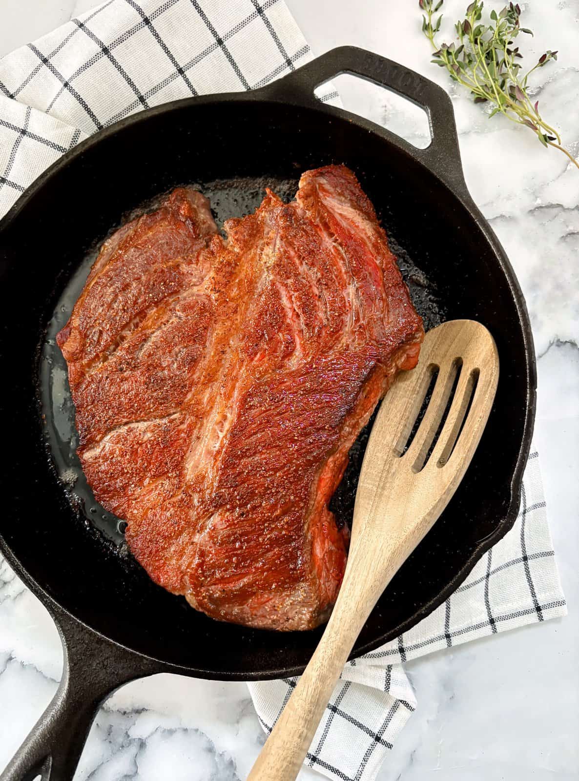 seared pot roast on a pan