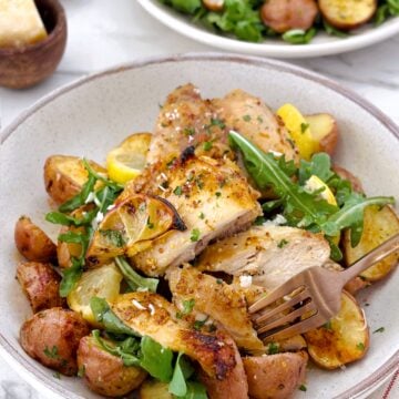 lemon chicken with potatoes on a plate