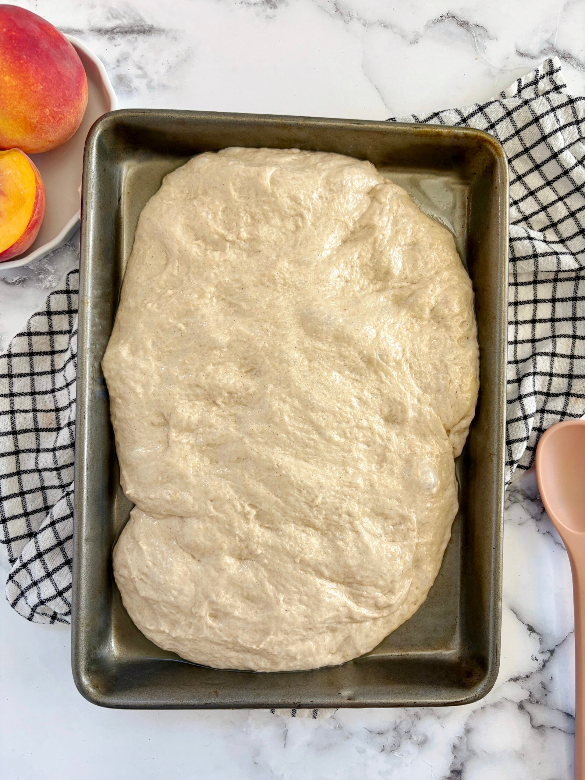 dough in sheet pan proofing