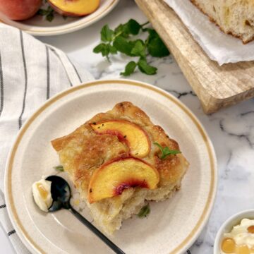 plate of peach focaccia bread on a plate