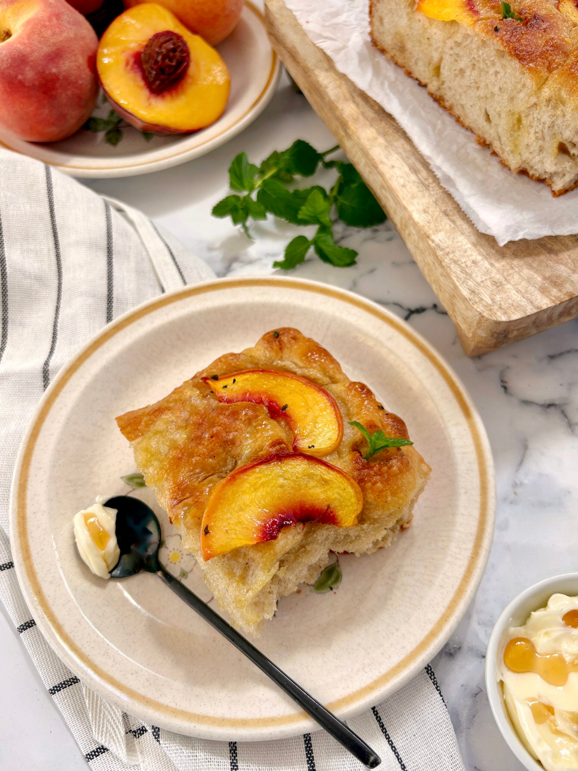 plate of peach focaccia bread on a plate 